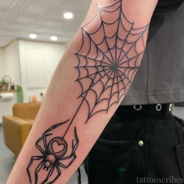 spider web elbow tattoo meaning