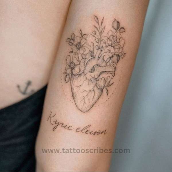 anatomical heart tattoo with flowers meaning