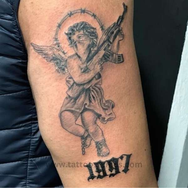 angel with ak 47 tattoo meaning