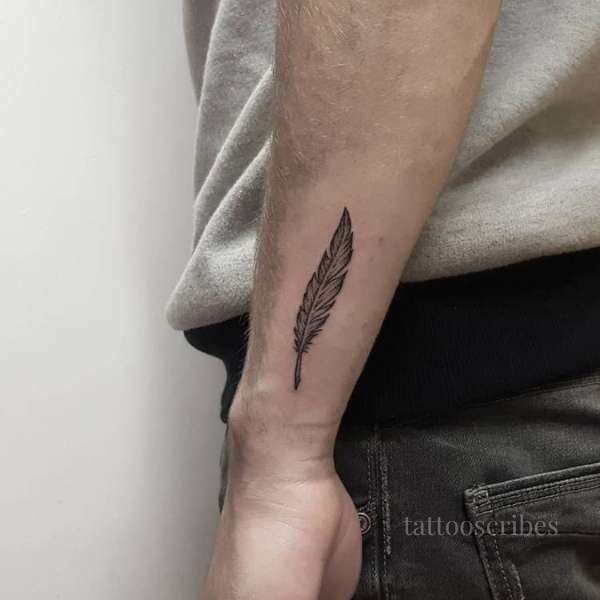 men's feather tattoo meaning