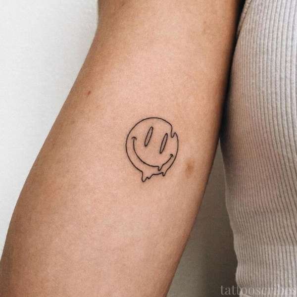 smiley face tattoo meaning