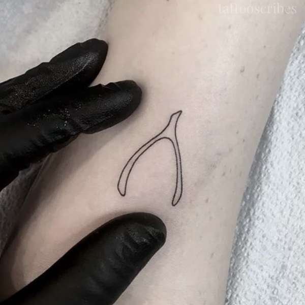 wishbone tattoo meaning